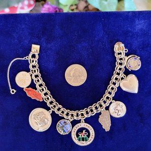 Vintage Sterling Silver Charm Bracelet with 9 Charms 50 grams Butterfly Wind Hea